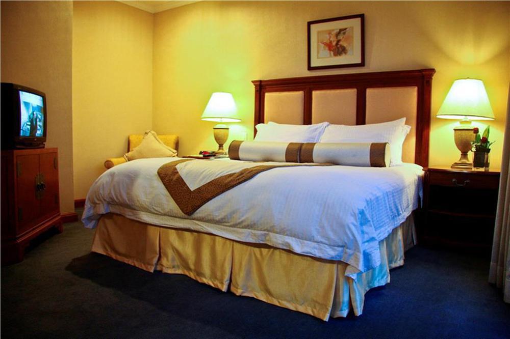 Discovery Suites Manila, Philippines Pásig Habitación foto